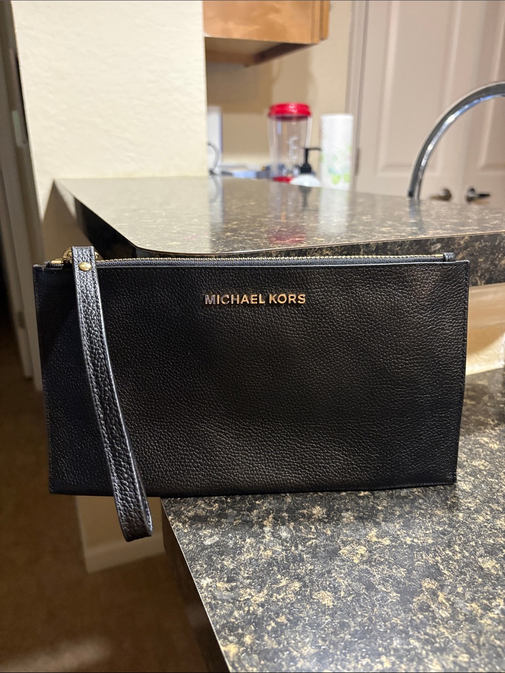 Michael Kors Black Leather Wristlet with Gold Logo